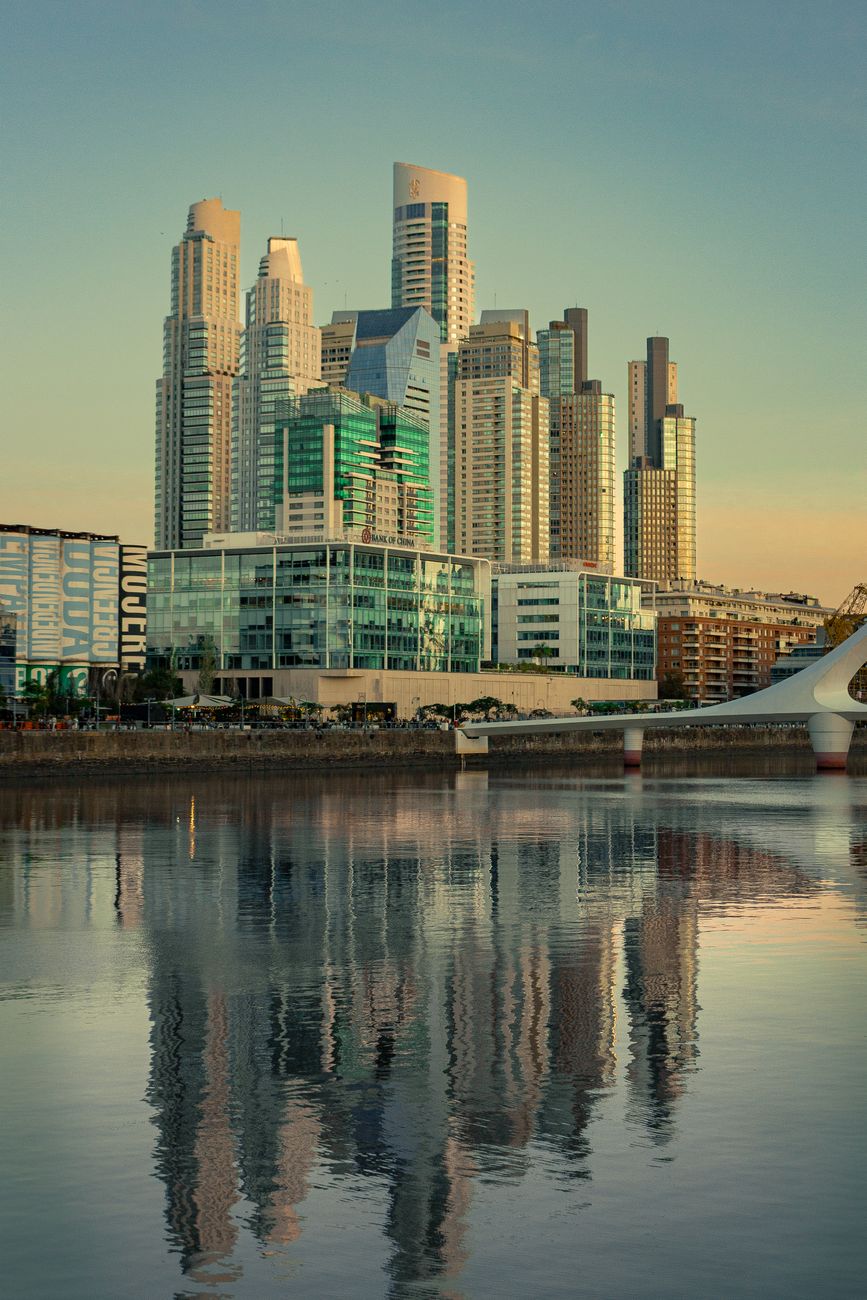 Buenos Aires skyline at sunset with Puente de la Mujer
